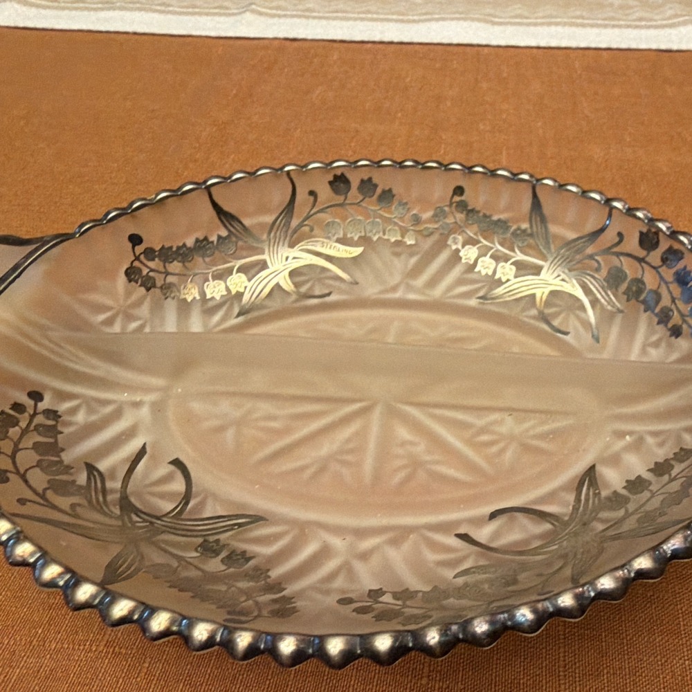 Vintage divided relish dish from the Silver City Glass Co with Sterling overlay